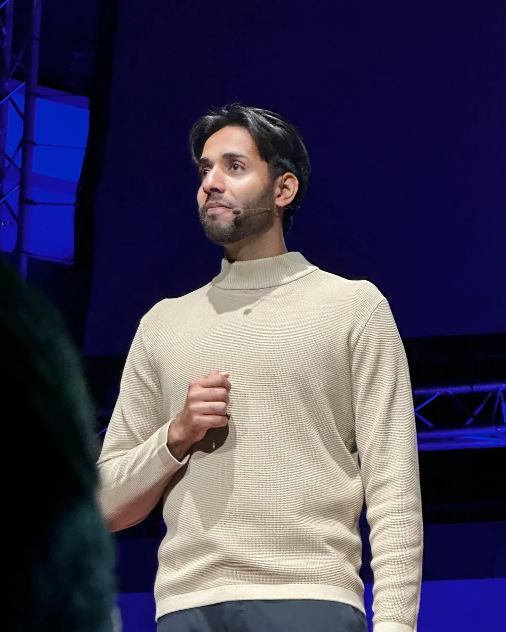 Dr Kiran Morjaria speaking on the TEDxManchester stage